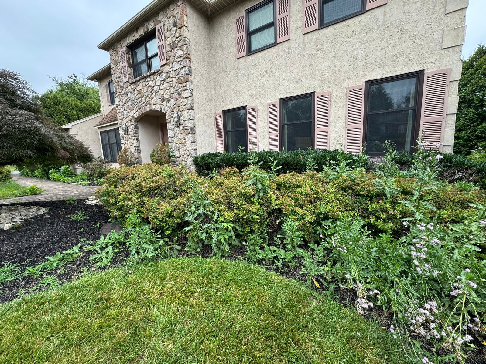 Mulch installation work by Green Force Property Services
